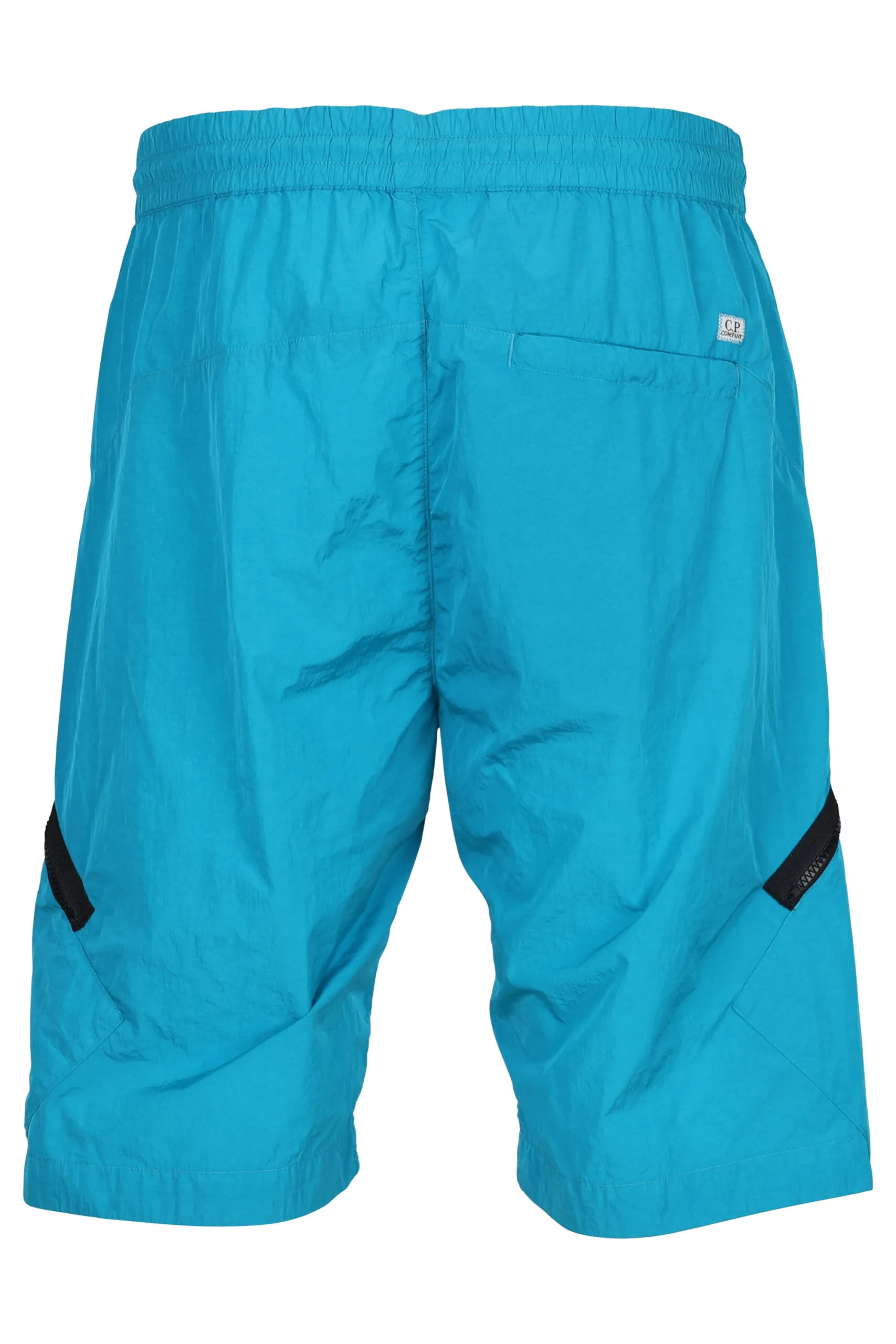 Pantalón corto azul turquesa con cremallera diagonal y logo lente