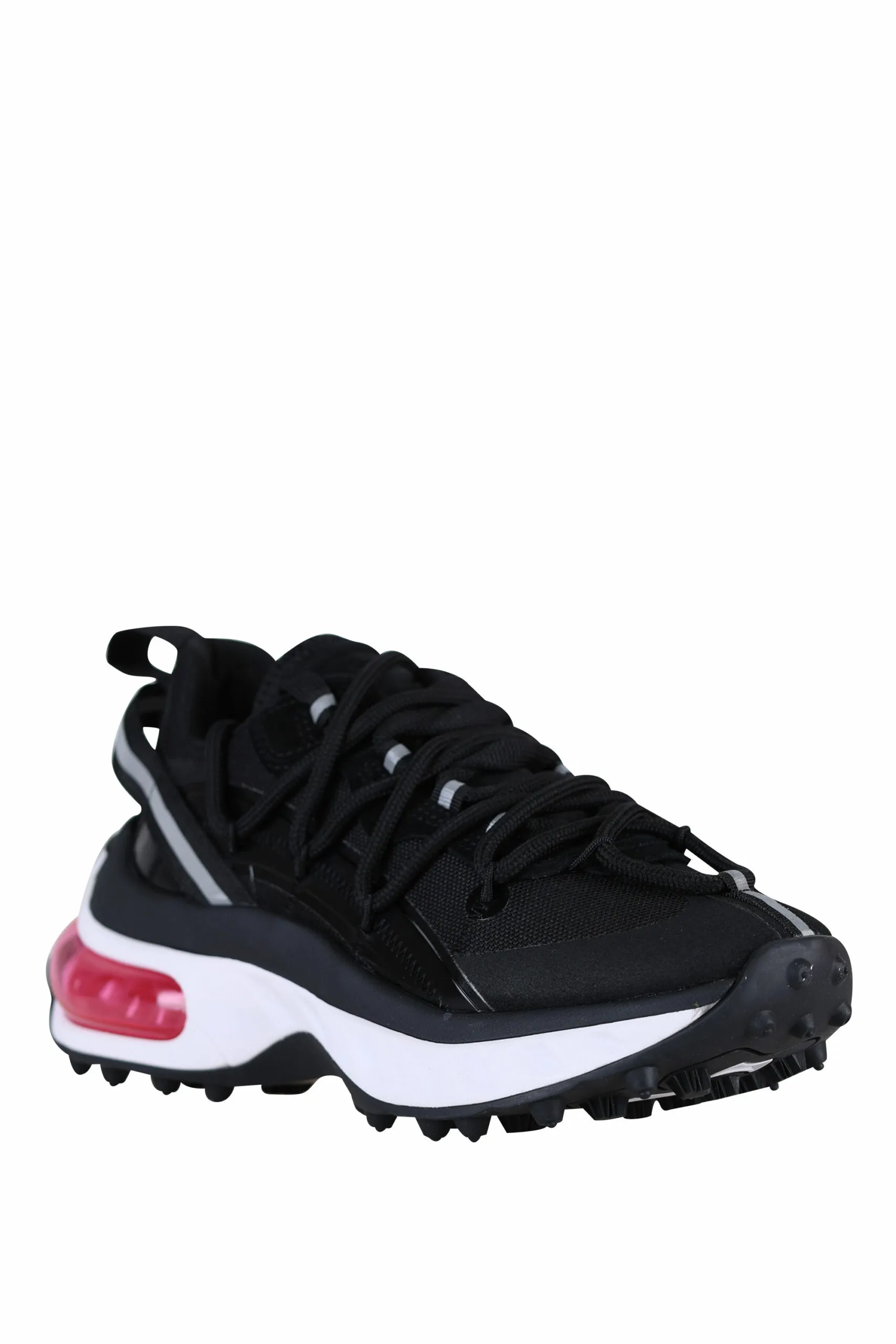Zapatillas negras con suela blanca y cámara de aire fucsia